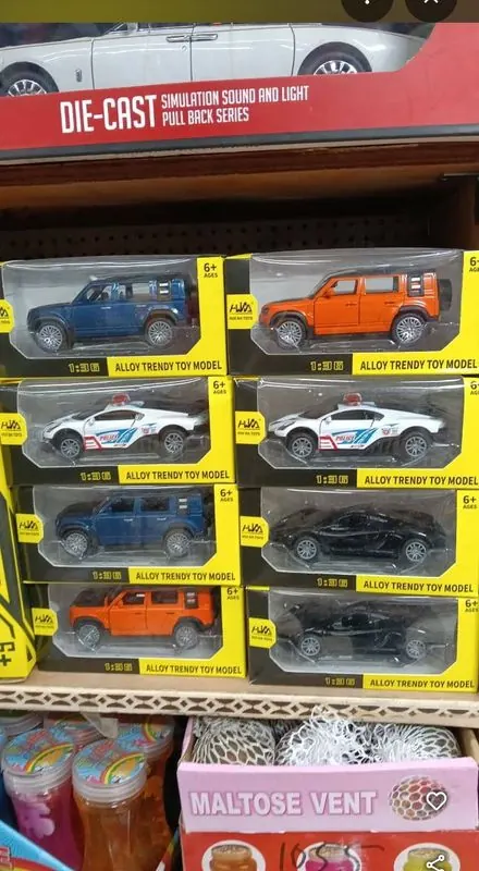 Assorted metal pull-back toy cars and SUVs