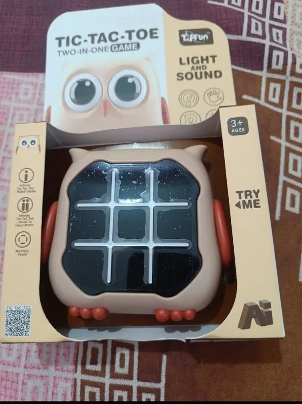 Electronic owl tic-tac-toe board game with light and sound